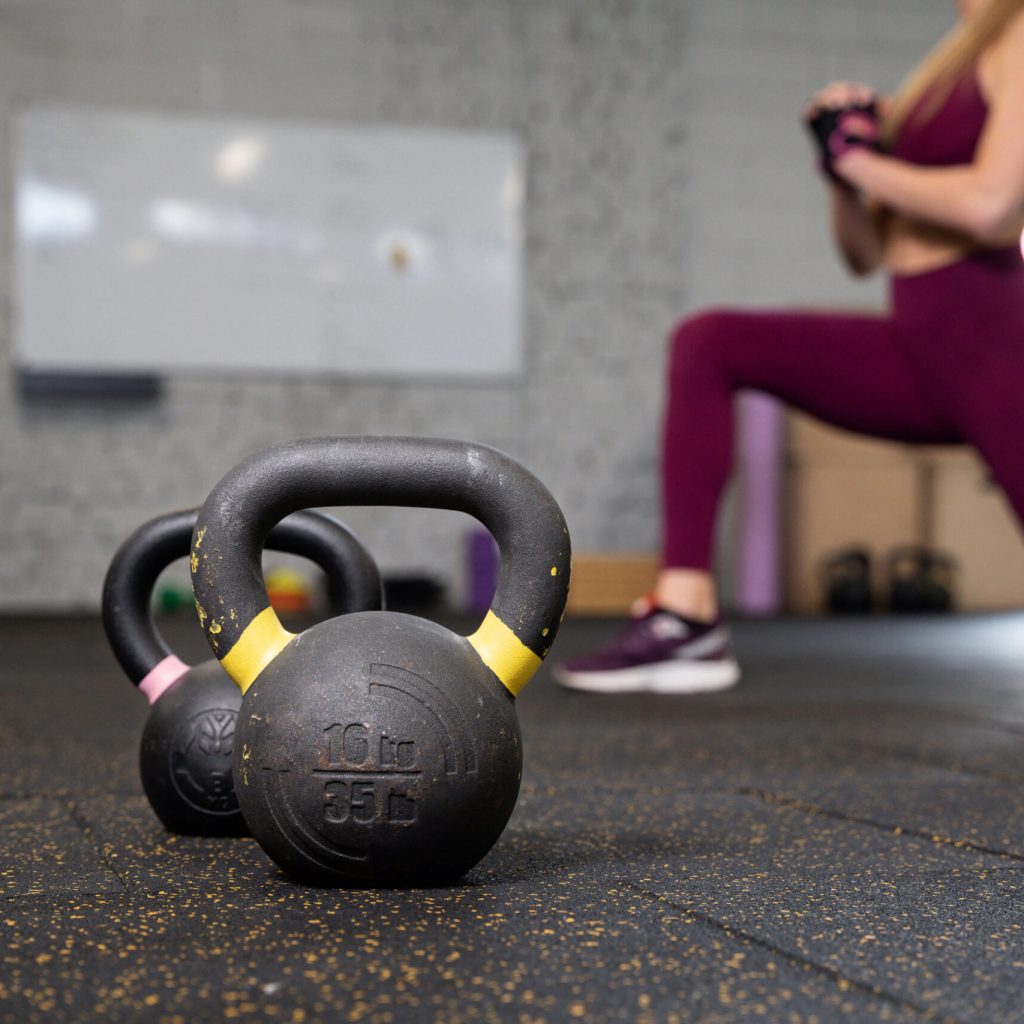 person-in-sport-gym-using-kettle (1)